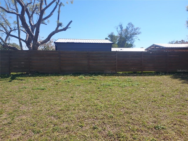 view of yard with fence