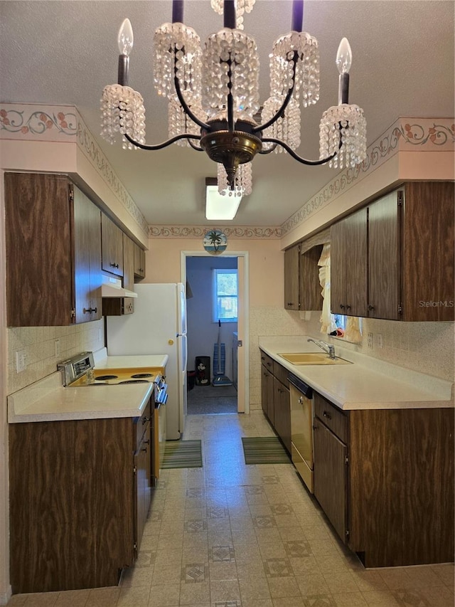 kitchen with a chandelier, electric range, dark brown cabinets, light countertops, and dishwasher