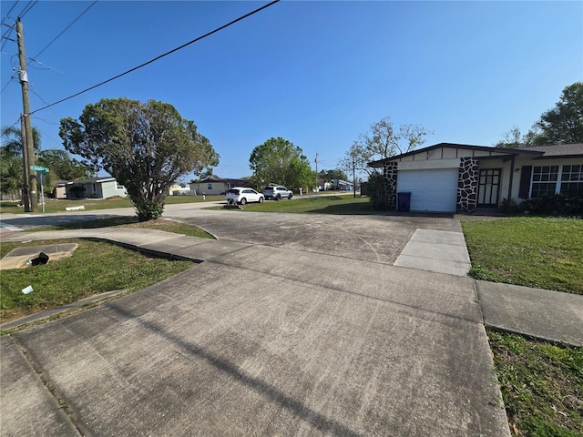 view of street featuring driveway