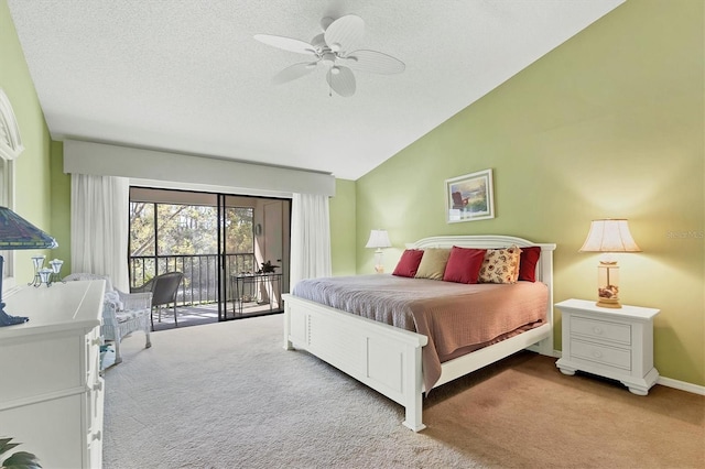 bedroom with carpet floors, access to outside, lofted ceiling, and a textured ceiling