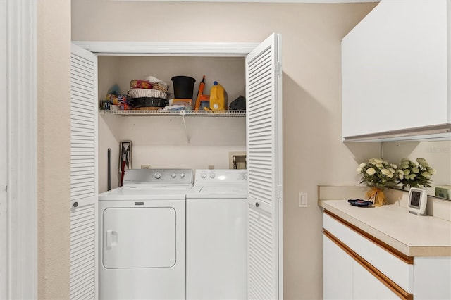 laundry room with washer and clothes dryer