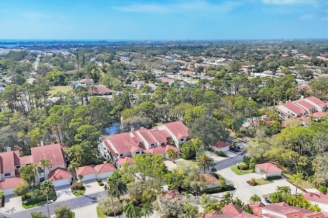 birds eye view of property with a residential view