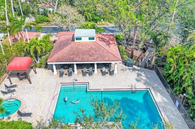 community pool with a patio