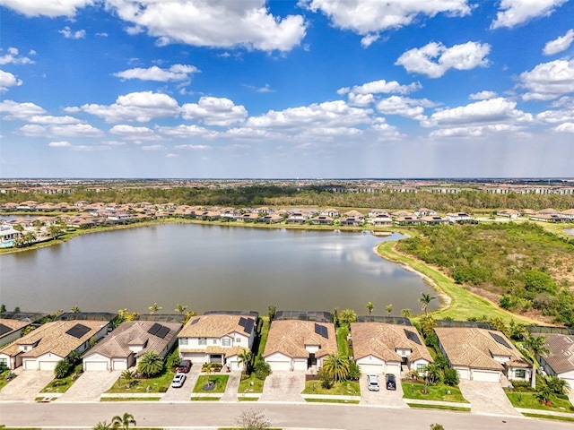 aerial view with a water view and a residential view