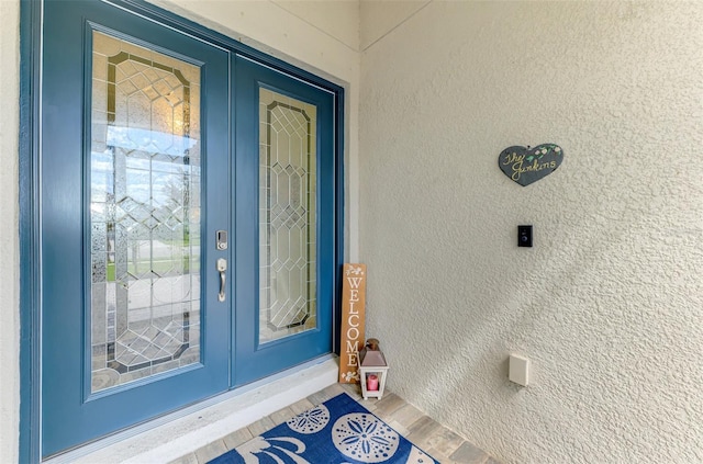 doorway to property with french doors