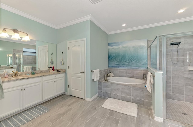 bathroom with ornamental molding, a stall shower, and a bath