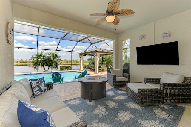 view of patio featuring a lanai, a water view, an outdoor pool, and an outdoor hangout area