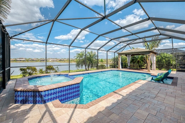 view of swimming pool featuring a water view, a pool with connected hot tub, a lanai, and a patio