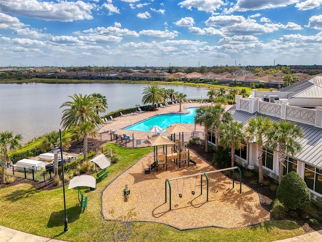 drone / aerial view with a water view