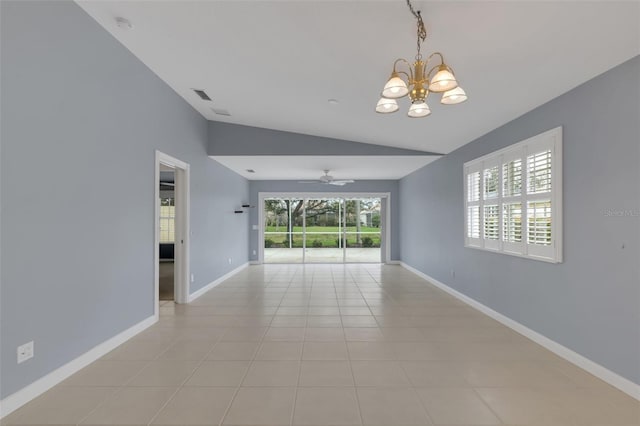 unfurnished room with visible vents, baseboards, lofted ceiling, light tile patterned flooring, and ceiling fan with notable chandelier