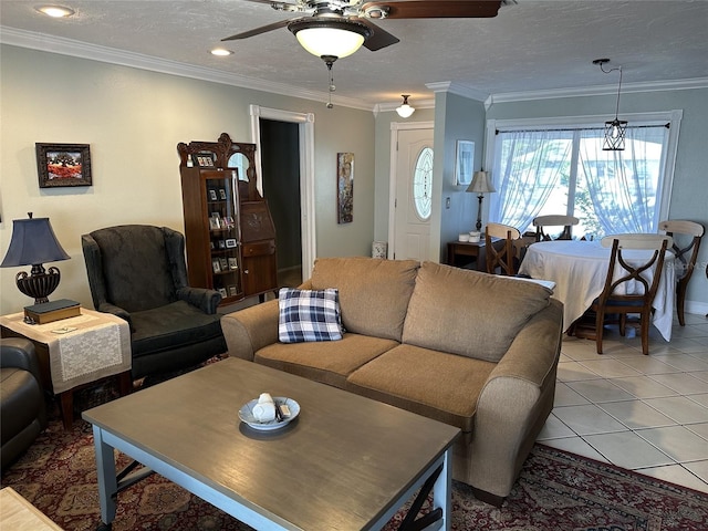 living room with crown molding, light tile patterned floors, recessed lighting, a ceiling fan, and a textured ceiling