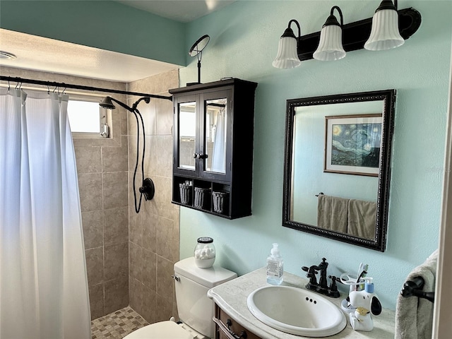 1805 Springwood Dr, Sarasota, FL 34232 - full bathroom with tiled shower, toilet, and vanity