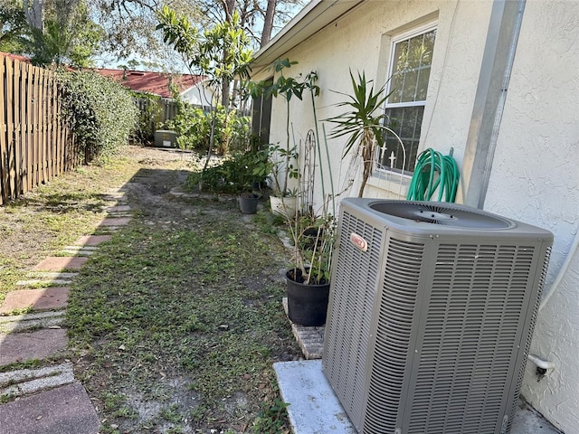 1805 Springwood Dr, Sarasota, FL 34232 - view of yard featuring central air condition unit and fence
