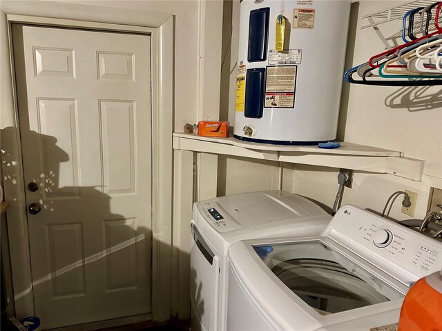1805 Springwood Dr, Sarasota, FL 34232 - washroom featuring water heater and washing machine and clothes dryer