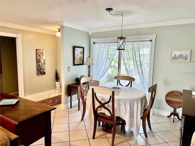 1805 Springwood Dr, Sarasota, FL 34232 - dining area with crown molding, light tile patterned floors, and baseboards