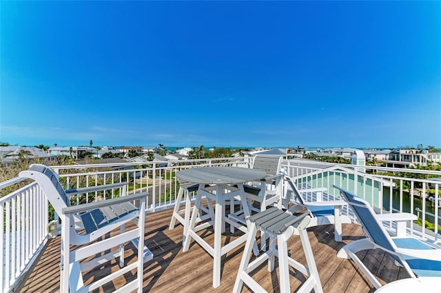 deck featuring a water view