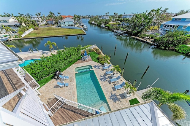 bird's eye view featuring a residential view and a water view