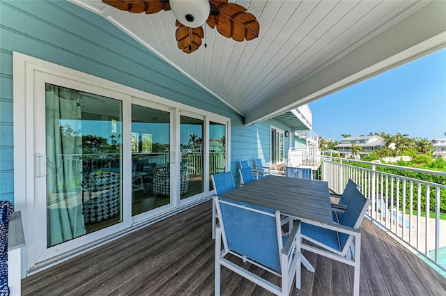 wooden deck featuring ceiling fan and outdoor dining area