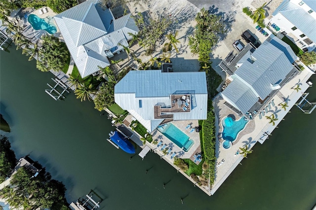 birds eye view of property featuring a water view