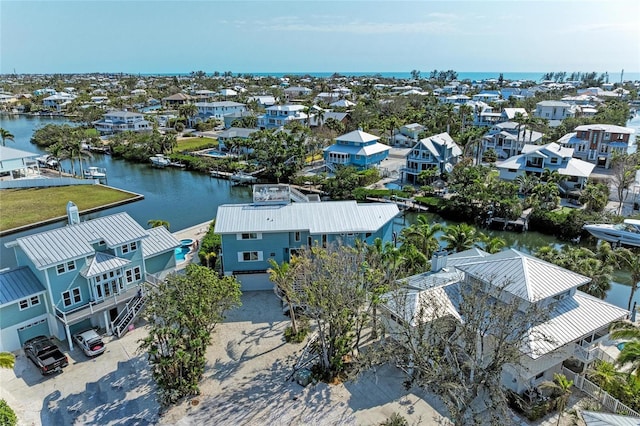 aerial view featuring a residential view and a water view