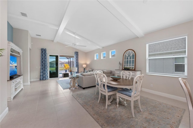 dining room with vaulted ceiling with beams, light tile patterned floors, baseboards, and visible vents