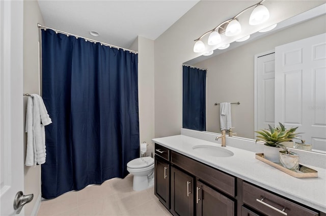 bathroom featuring toilet, curtained shower, vanity, and tile patterned floors