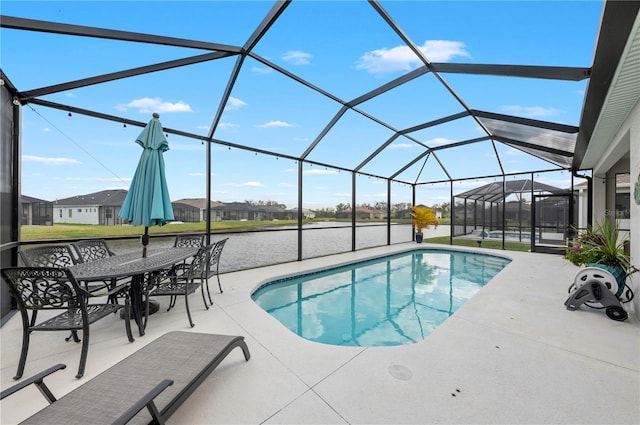 pool with a lanai, outdoor dining area, and a patio