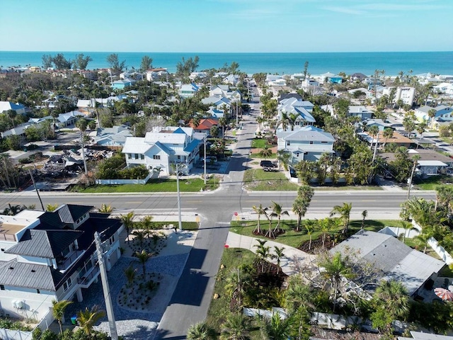 birds eye view of property featuring a water view and a residential view