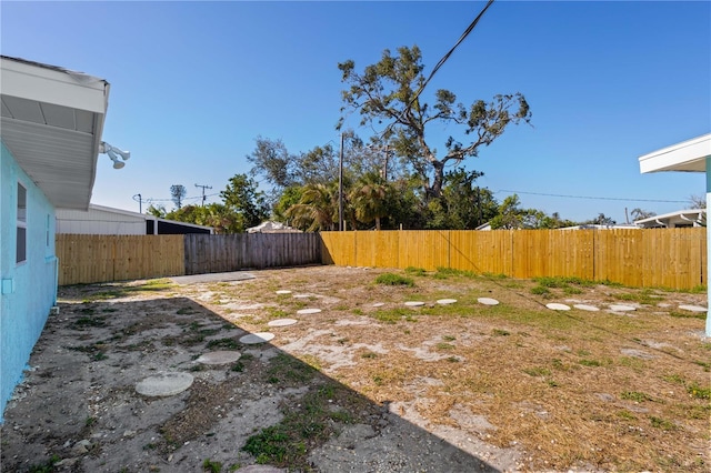 view of yard featuring fence