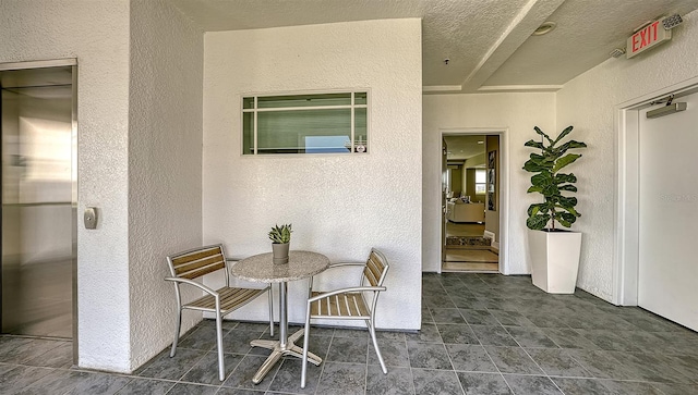 view of patio featuring elevator