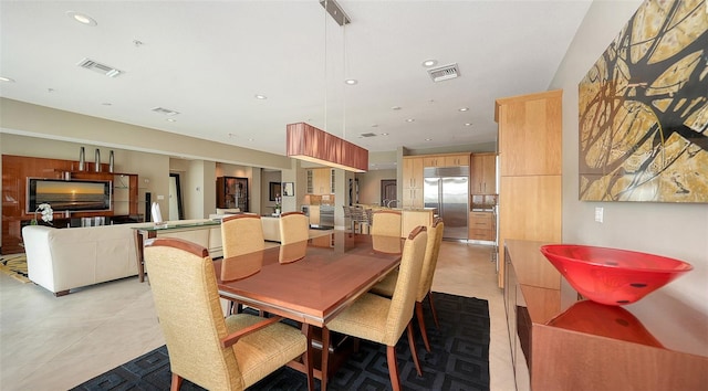 dining space featuring visible vents and recessed lighting