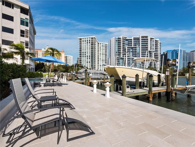 exterior space with a view of city and a boat dock