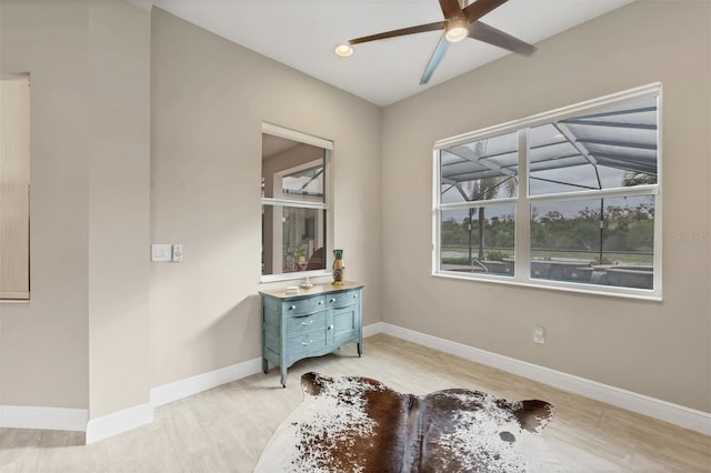 interior space with recessed lighting and baseboards