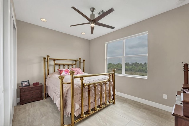 bedroom with ceiling fan, baseboards, and recessed lighting