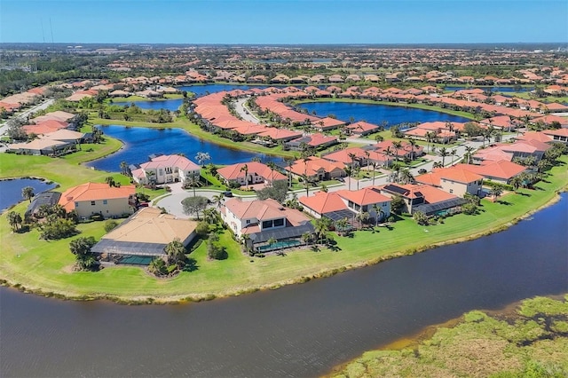 aerial view featuring a water view and a residential view