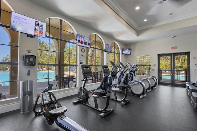 workout area with ornamental molding, recessed lighting, french doors, and plenty of natural light