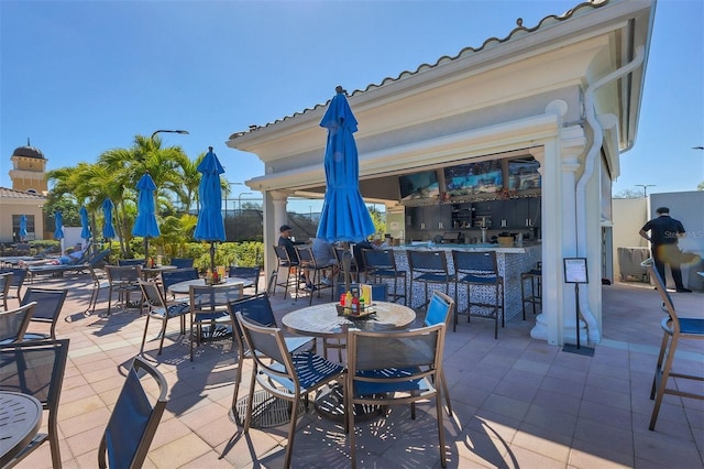 view of patio featuring outdoor dry bar