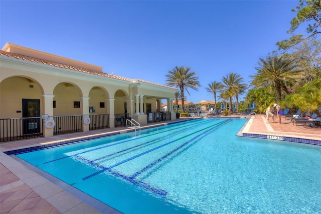 pool with a patio