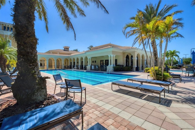 community pool featuring a patio