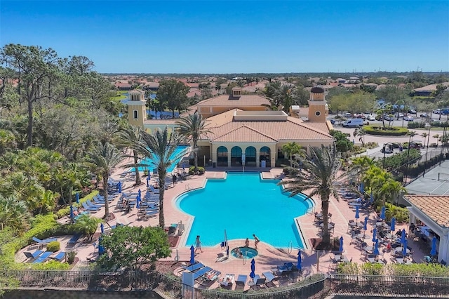 pool with a patio area