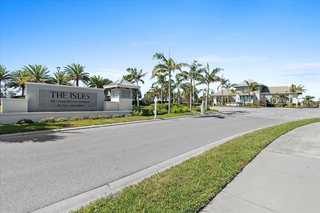 view of street with sidewalks and curbs