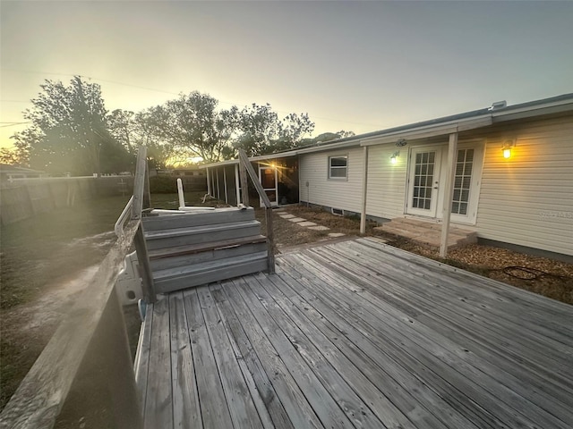 deck at dusk with french doors