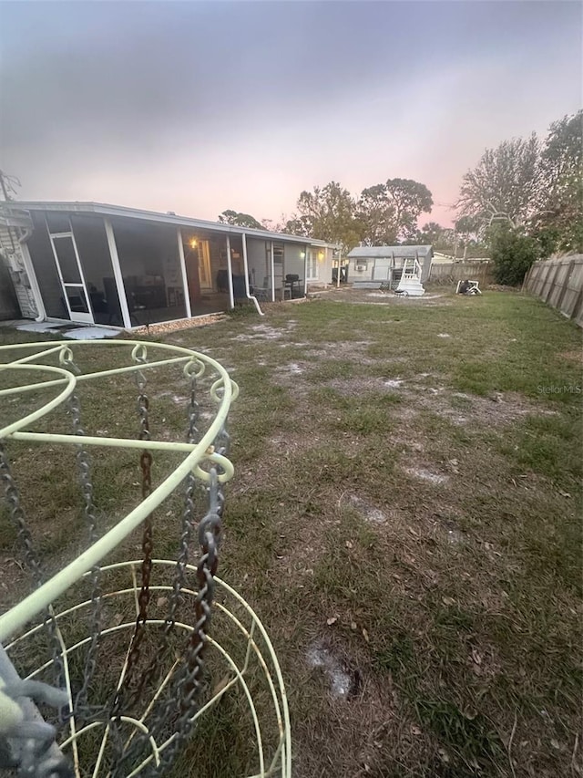 view of yard featuring fence