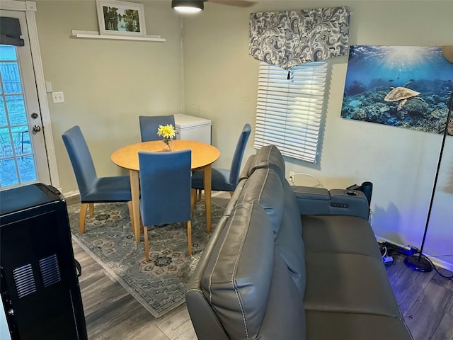 dining room with wood finished floors