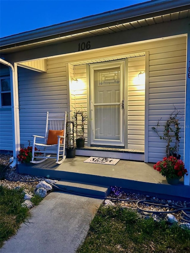 property entrance with a porch