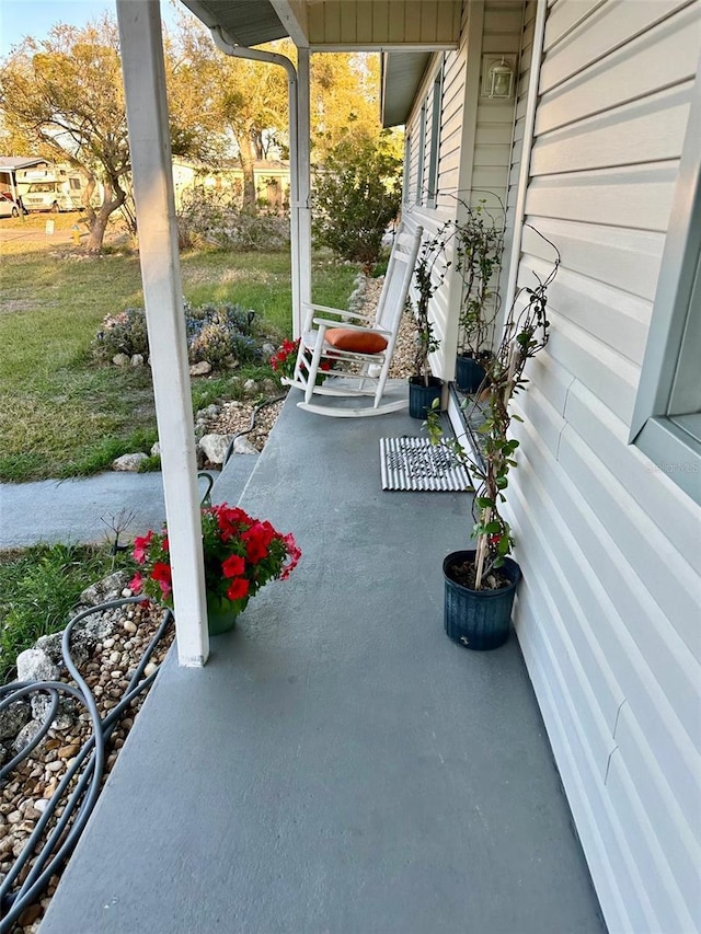 view of patio featuring a porch