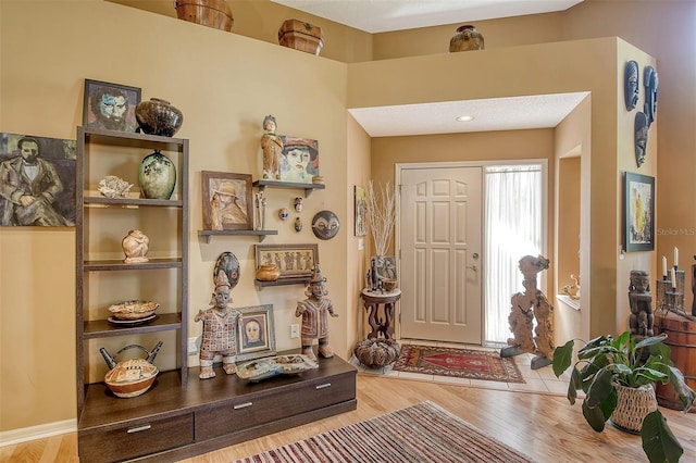 foyer with wood finished floors