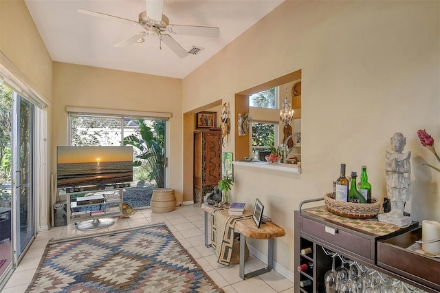 interior space with visible vents and a ceiling fan