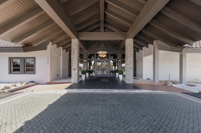 entrance to property featuring french doors