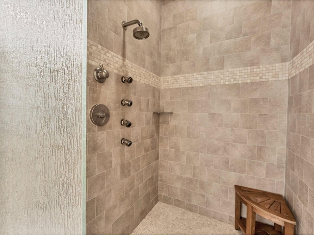 6512 Midnight Pass Rd Unit 504, Sarasota, FL 34242 - bathroom featuring a tile shower